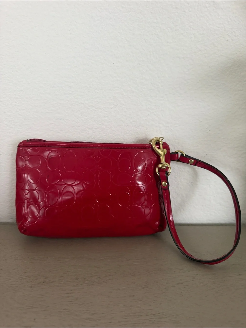 Coach glossy red